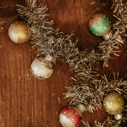Tinsel Garland with Striped Bulbs